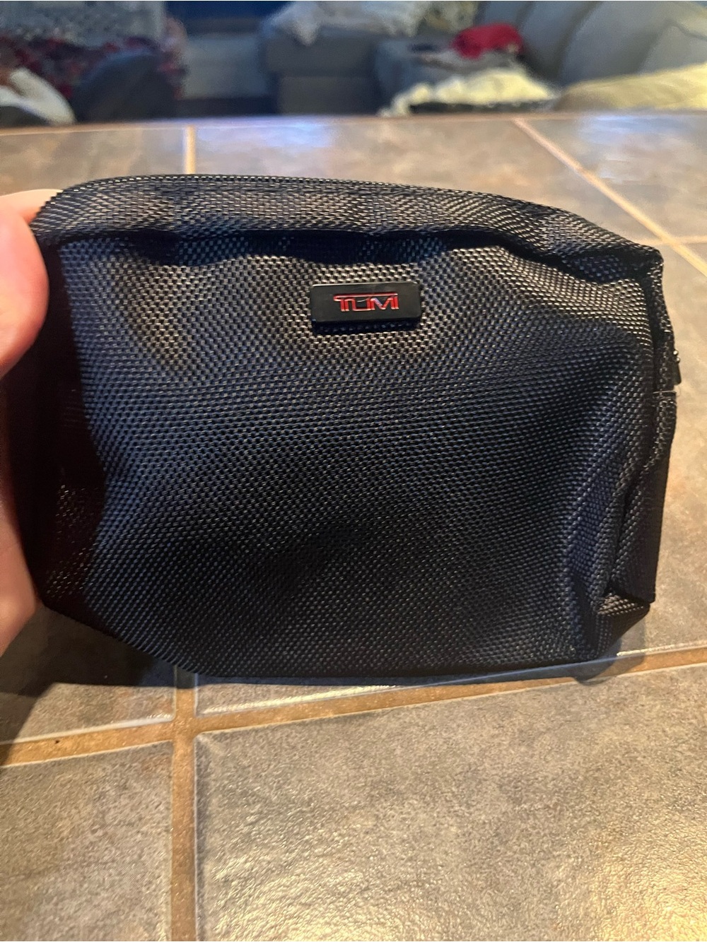 Tumi Black Toiletry Pouch with Red Logo